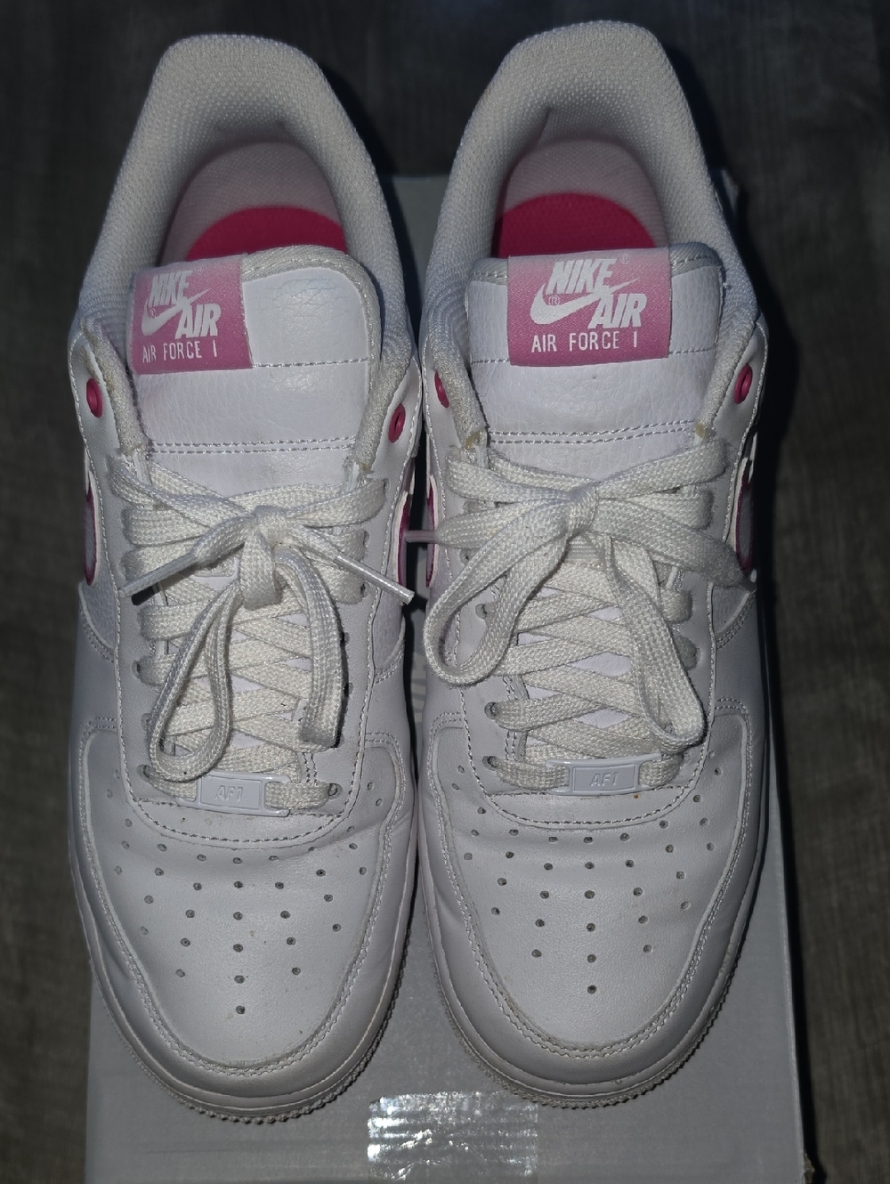 Nike Air Force 1 White Sneakers with Pink Accents